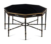 A Regency Style Ebonized and Parcel Gilt Center Table