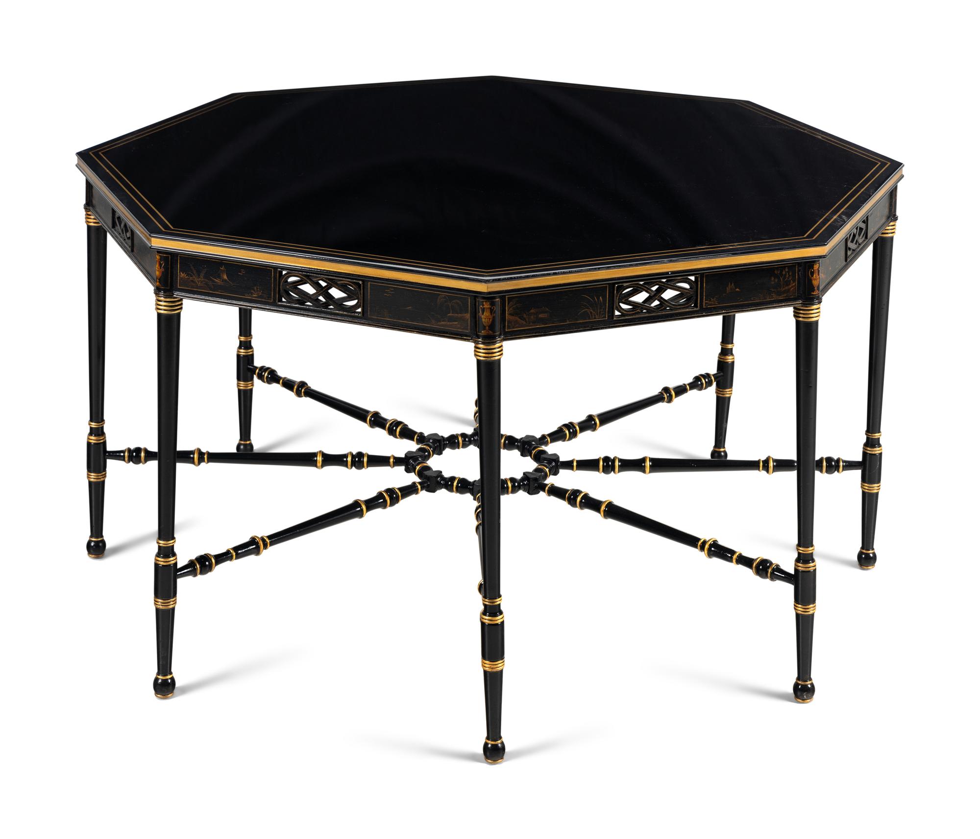 A Regency Style Ebonized and Parcel Gilt Center Table