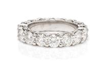 A Platinum and Diamond Eternity Band, 6.40 dwts.