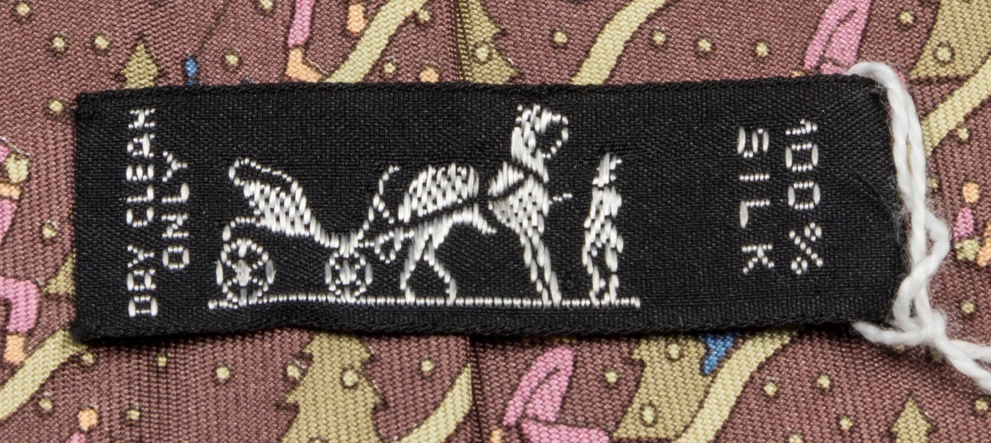 A Group of Two Hermes Silk Ties, 3.15" wide.