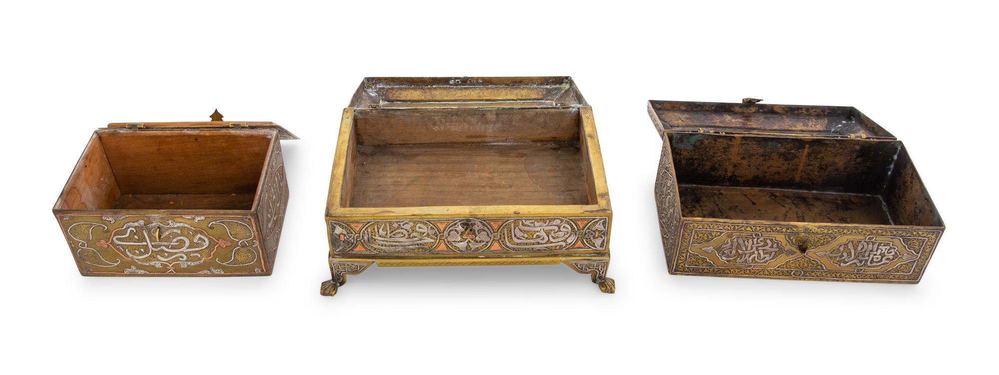 Three Silver Inlaid Brass Table Caskets