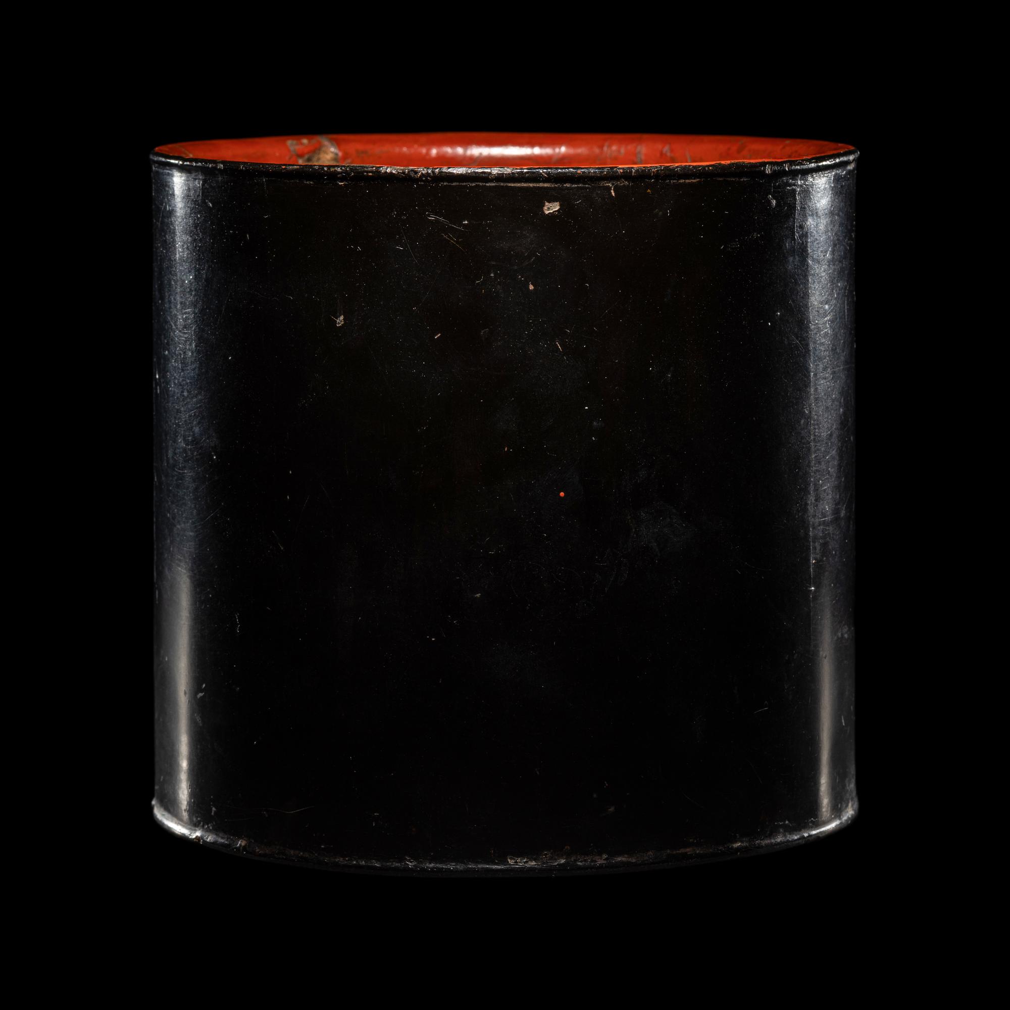 A Chinese Black and Red Lacquered Brushpot, Bitong, Wanli Mark 萬曆丙午（1606）款黑漆素面筆筒