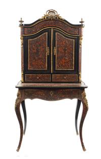 A Napoleon III Boulle Marquetry and Gilt Metal Mounted Bonheur du Jour, Height 63 x width 32 x depth 20 inches.