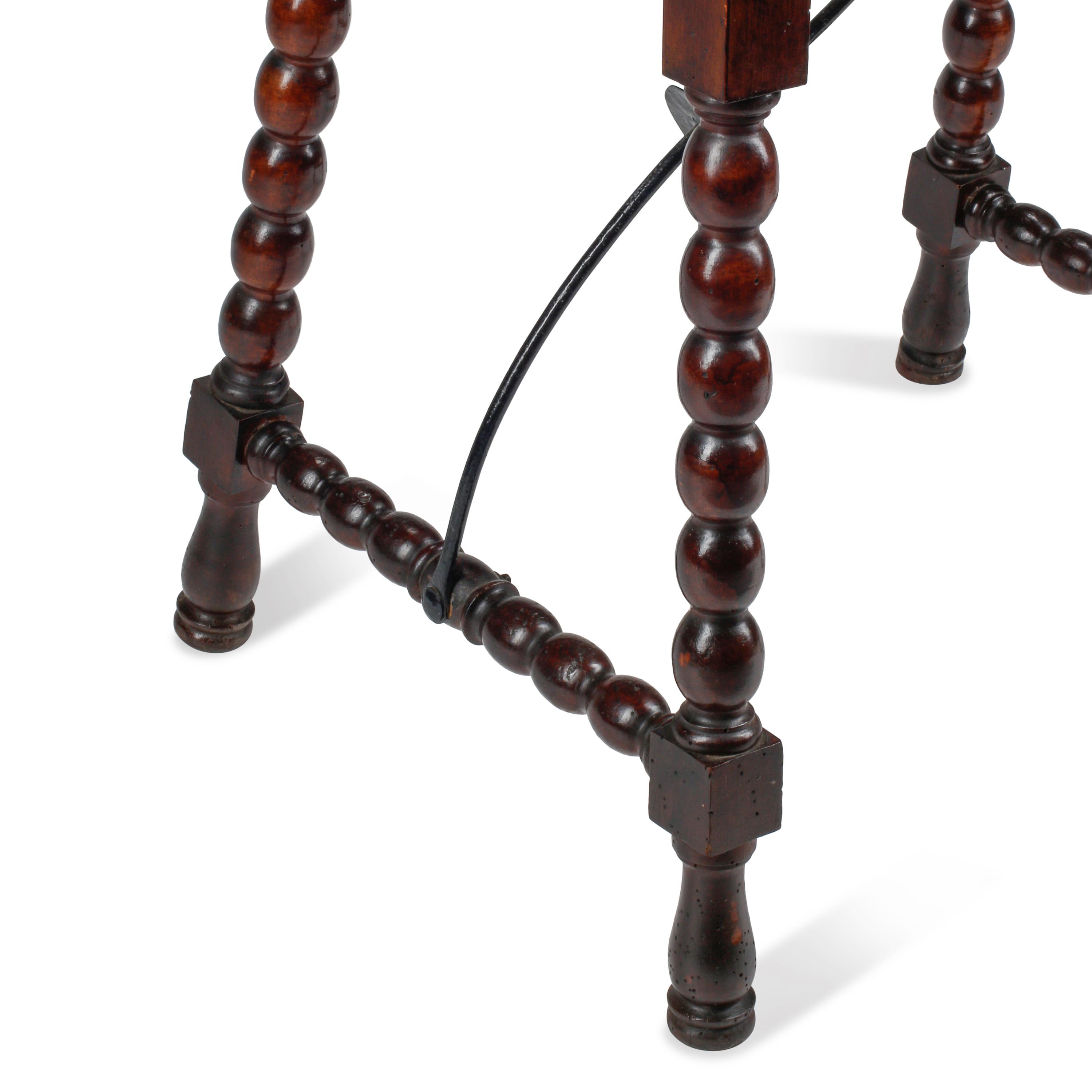 A Small Spanish Baroque Style Iron Mounted Trestle Table