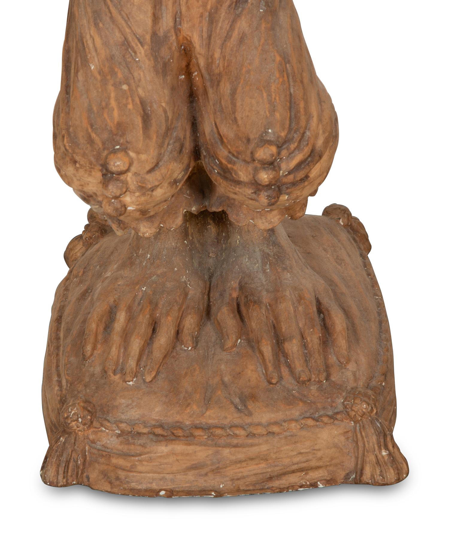 A Pair of Terra Cotta Monkey Pedestals