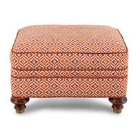 An Upholstered Mahogany Ottoman