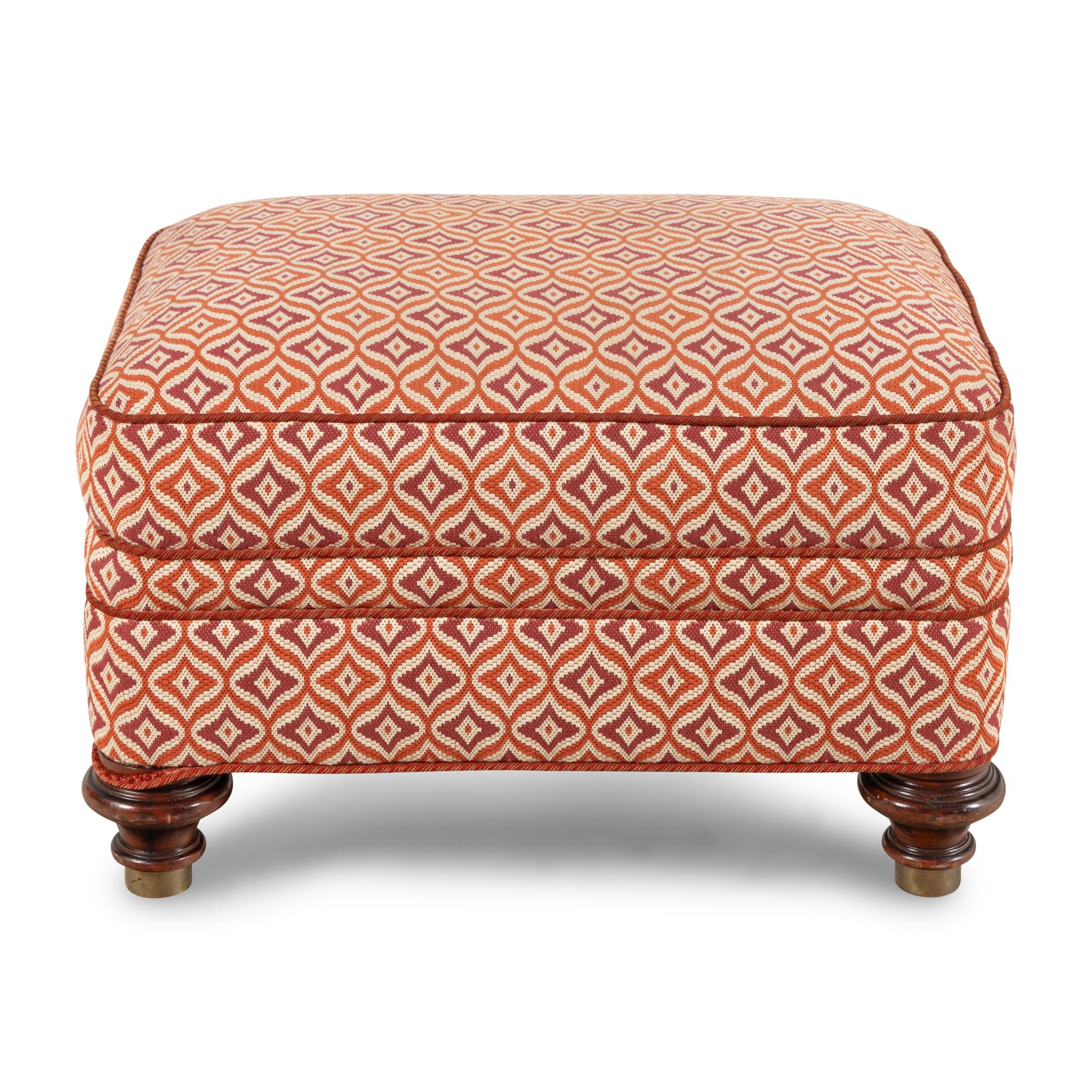 An Upholstered Mahogany Ottoman