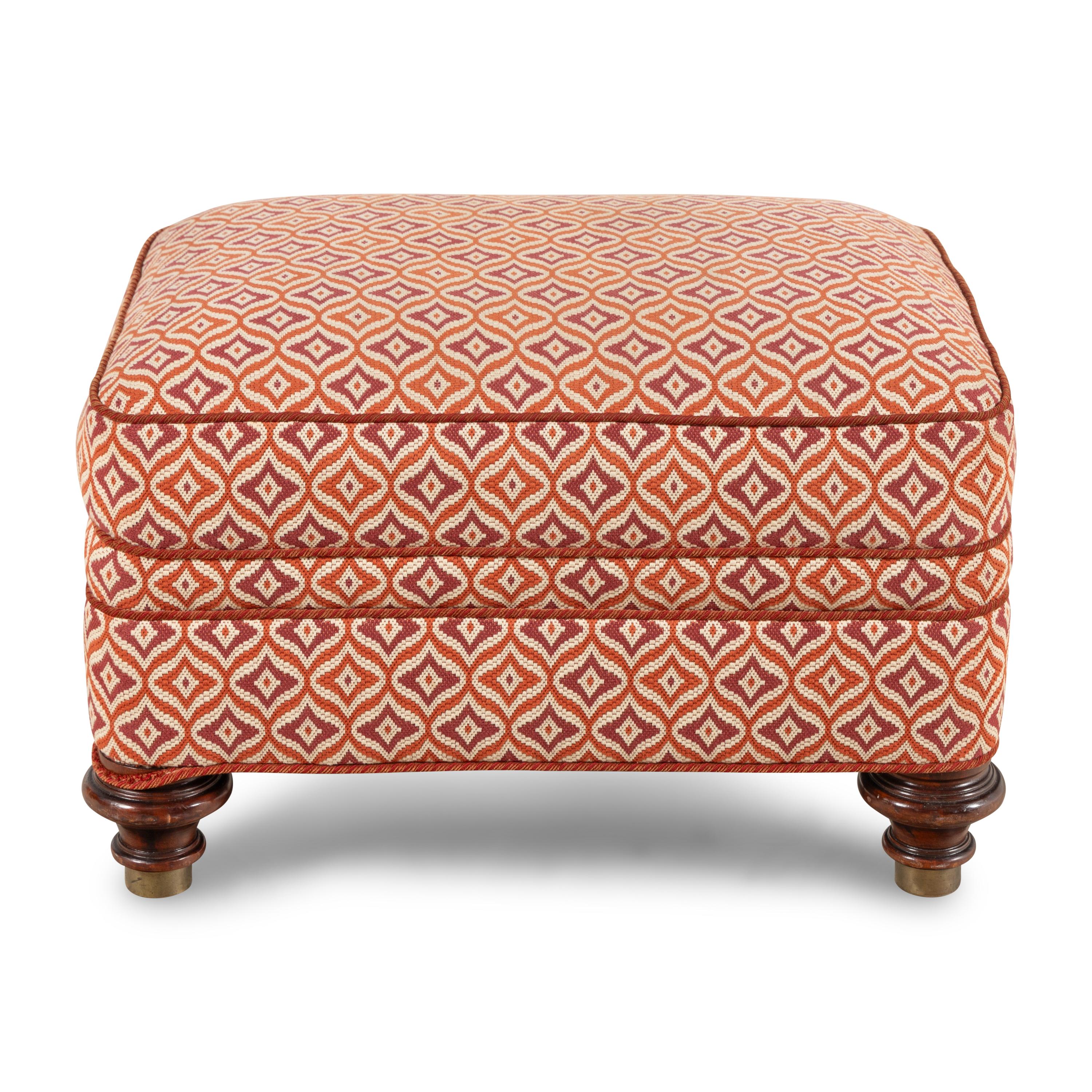 An Upholstered Mahogany Ottoman