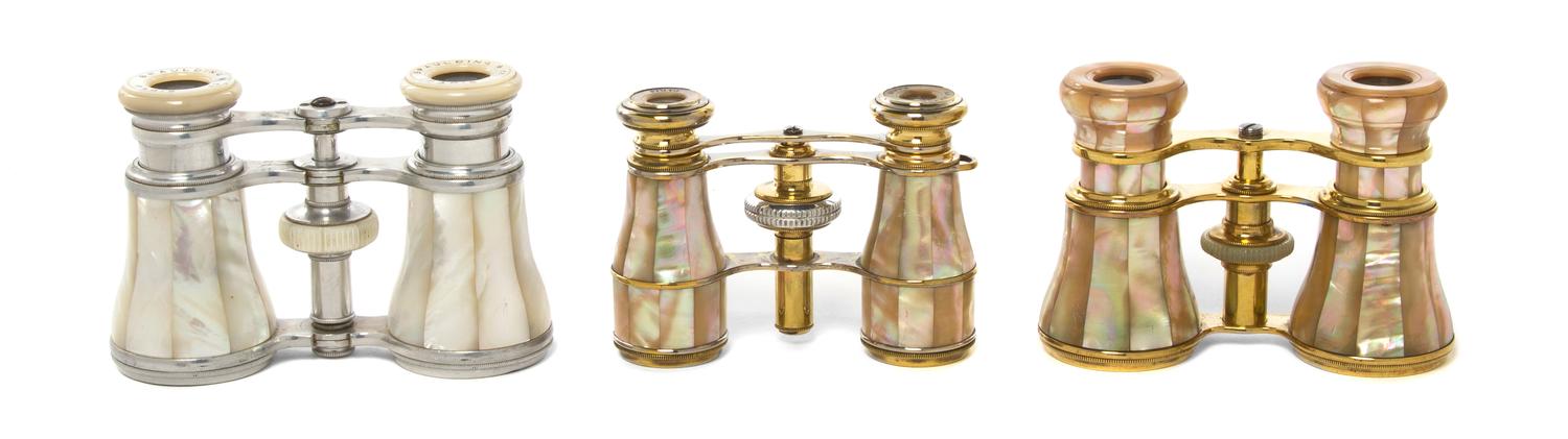 Three Pairs of French Mother-of-Pearl Veneered Opera Glasses, Width of widest 4 3/8 inches.