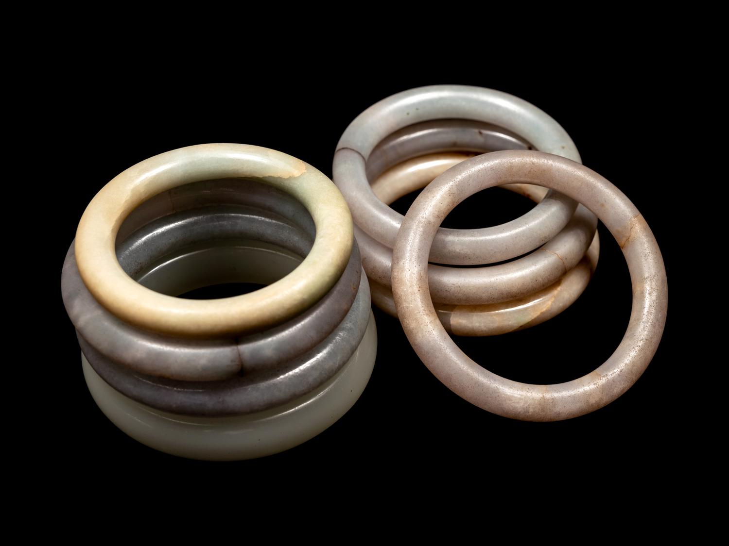 Eight Chinese Jade and Hardstone Bangles