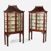 A pair of Chinese Chippendale style carved mahogany and glass display cabinets 20th century