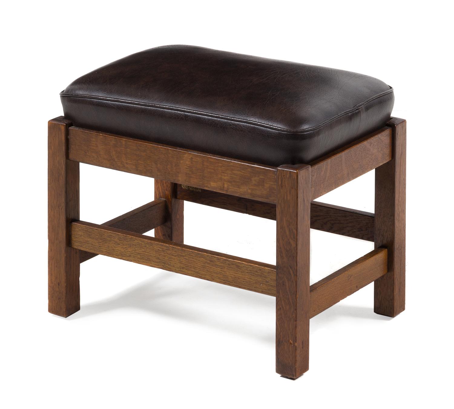L. & J.G. Stickley, EARLY 20TH CENTURY, an oak stool, with brown leather cushion