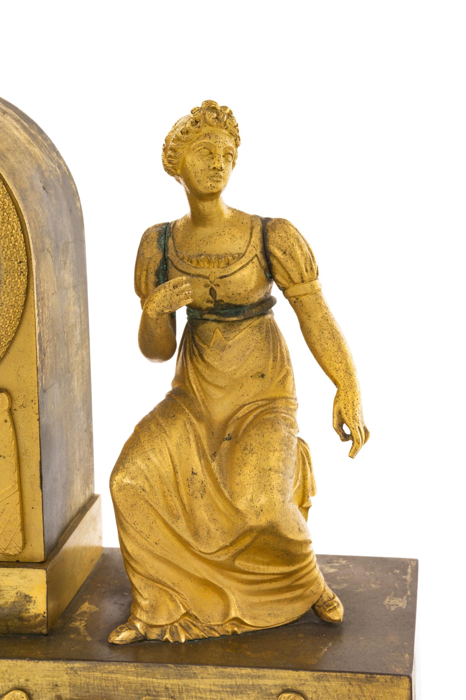 An Empire Gilt Bronze Clock
