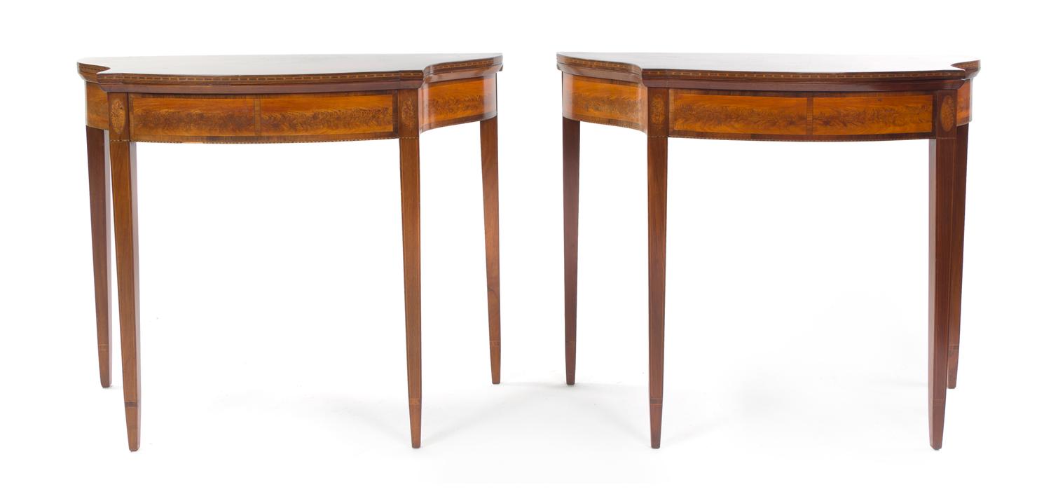 A Pair of Sheraton Style Mahogany Games Tables, Height 28 3/4 x width 34 1/2 x depth 17 inches.