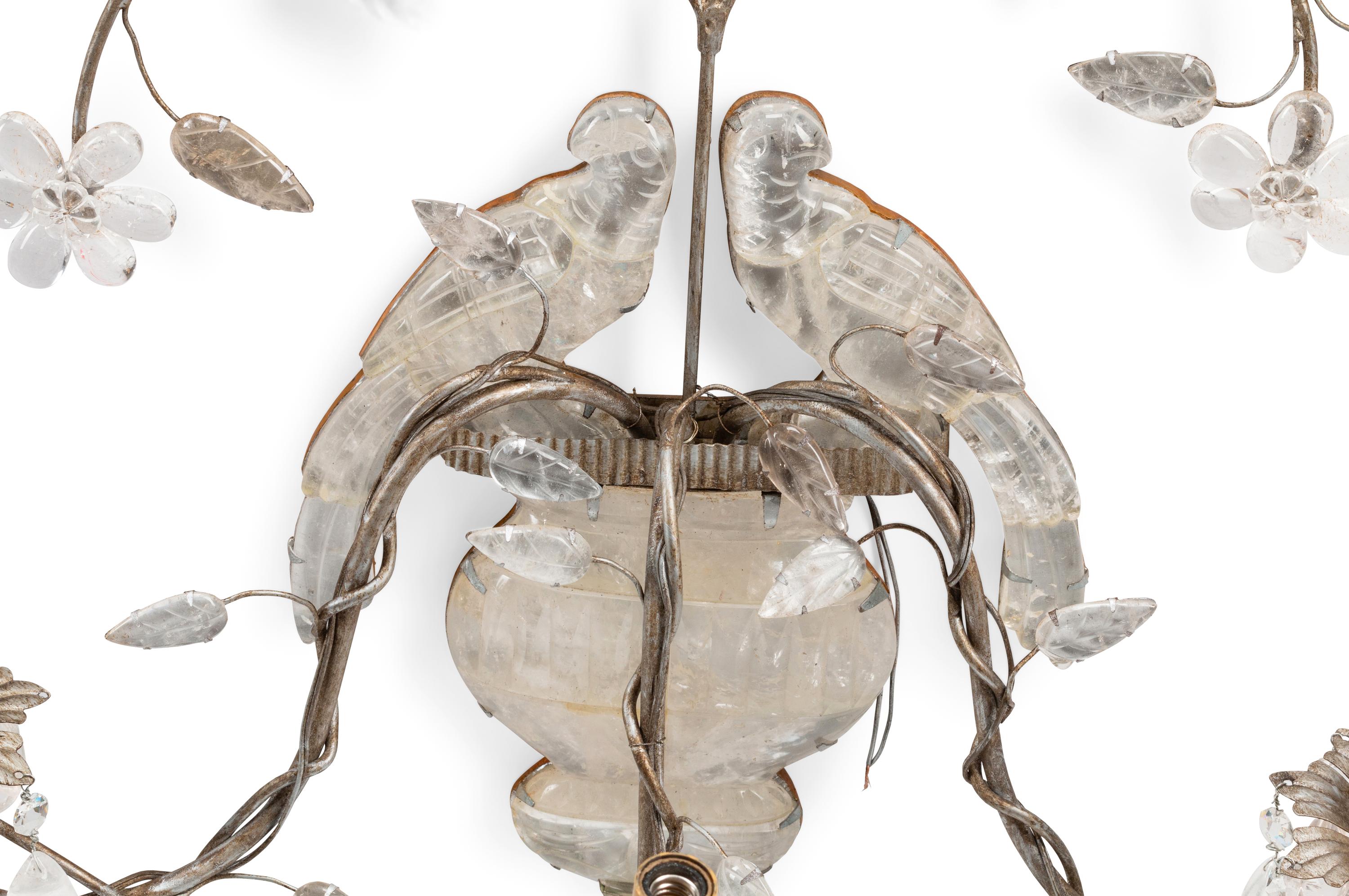 A Pair of Silvered Wood and Rock Crystal Three-Light Sconces, in the Style of Maison Baguès