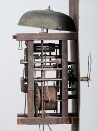 A Chippendale Cherrywood and Tiger Maple Tall Case Clock