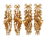 A Set of Four French Giltwood Trophy Appliqués