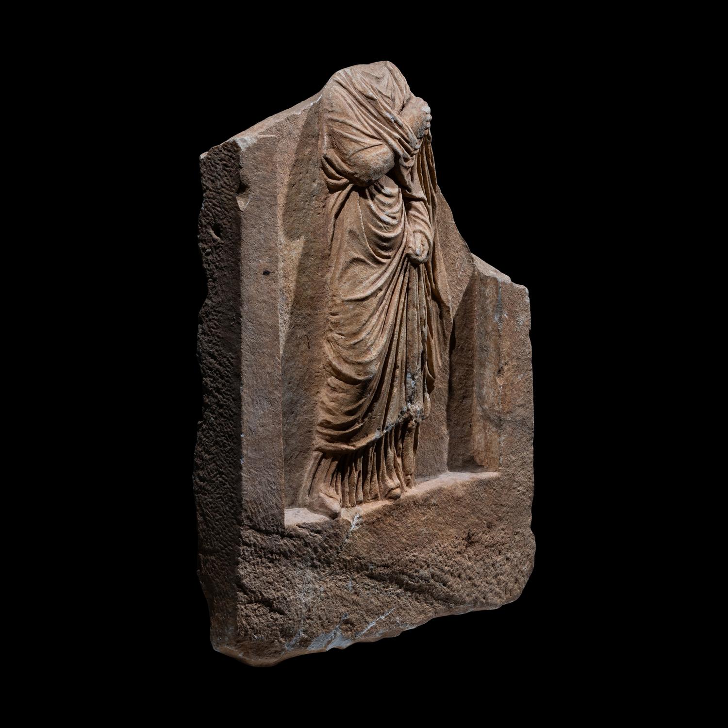 A Roman Marble Funerary Relief Fragment