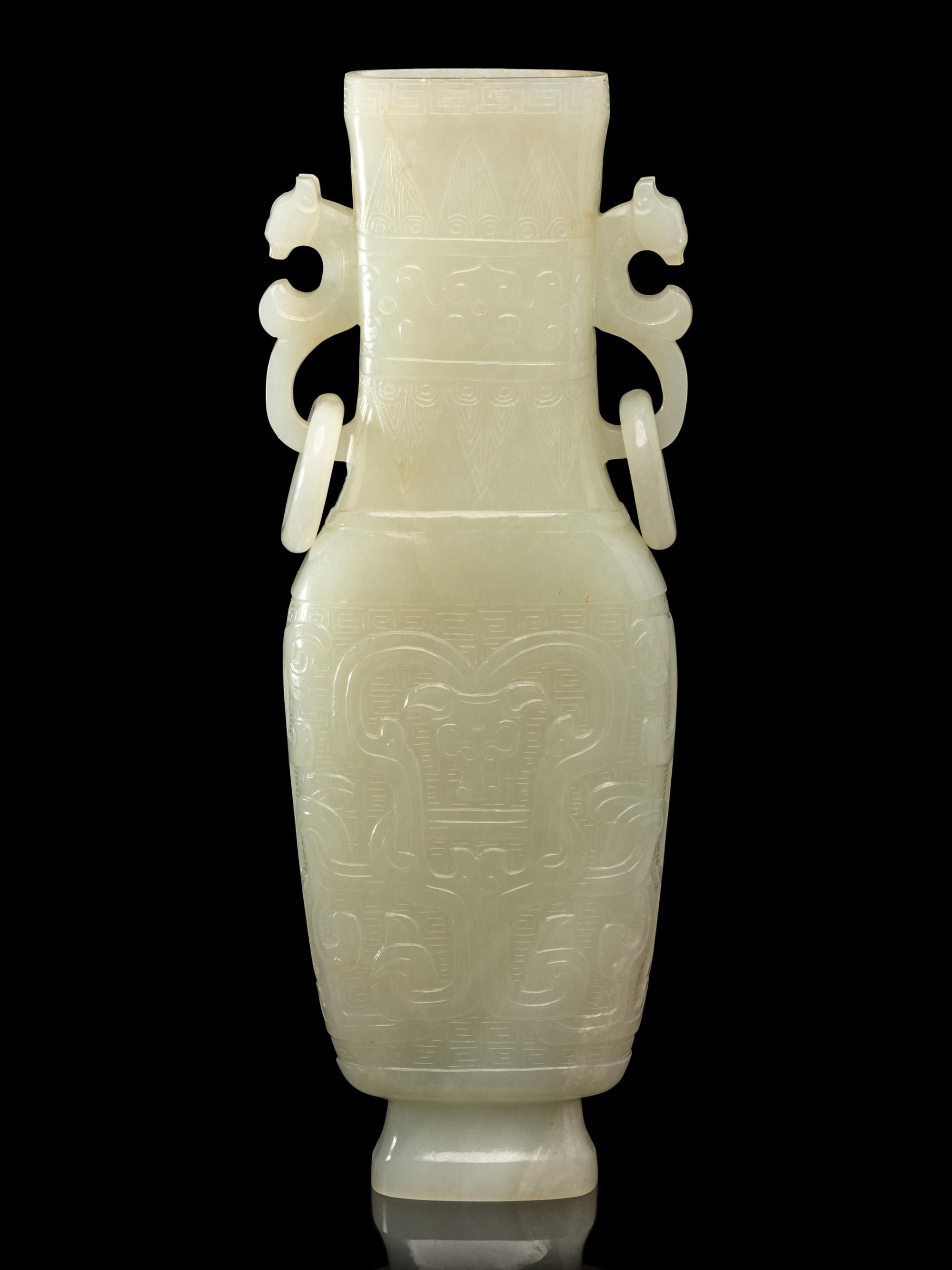 A Chinese Pale Celadon Jade Flattened Vase, Late Qing/Republic Period 晚清/民國 青白玉仿古雙耳瓶