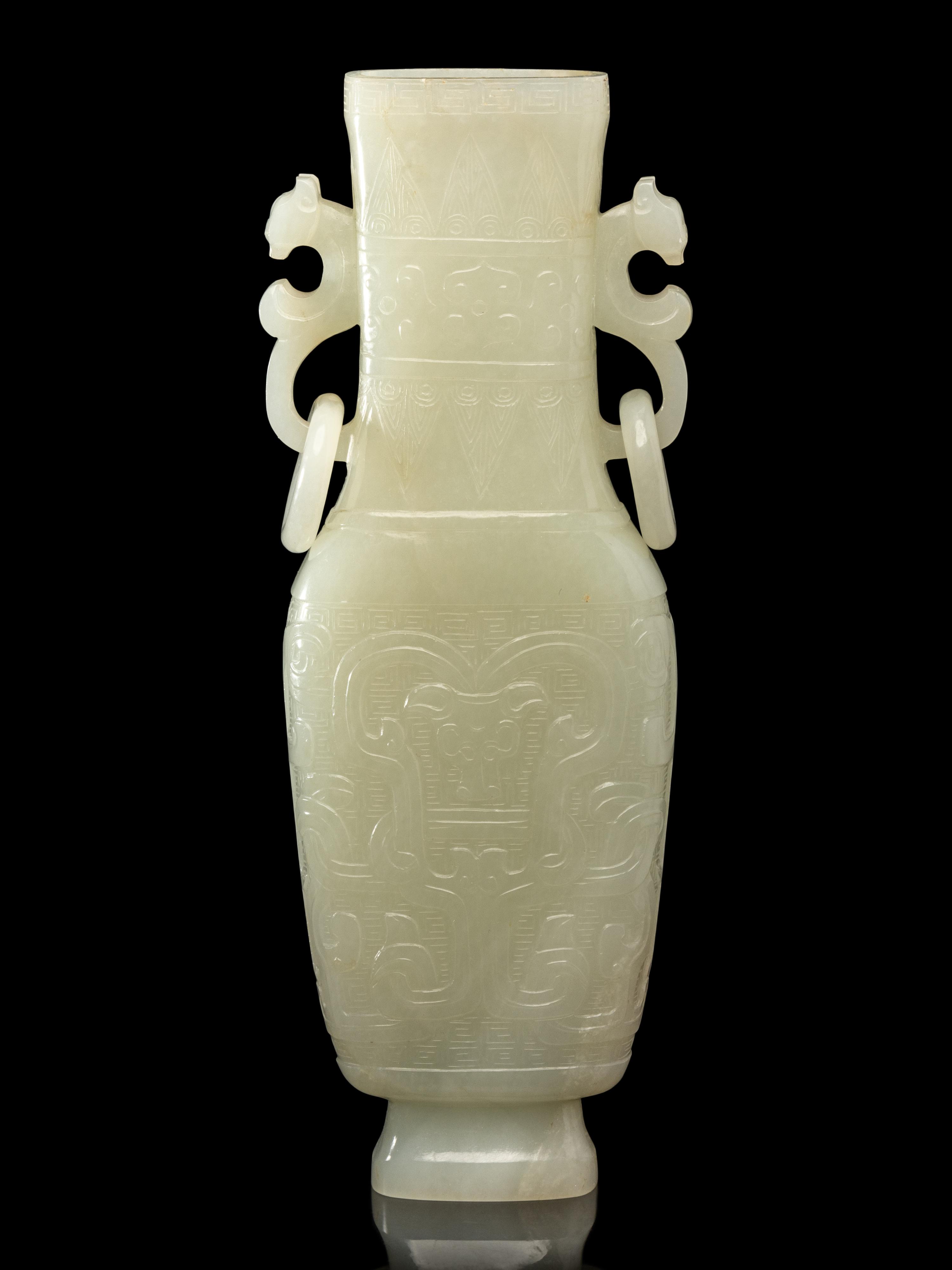 A Chinese Pale Celadon Jade Flattened Vase, Late Qing/Republic Period 晚清/民國 青白玉仿古雙耳瓶