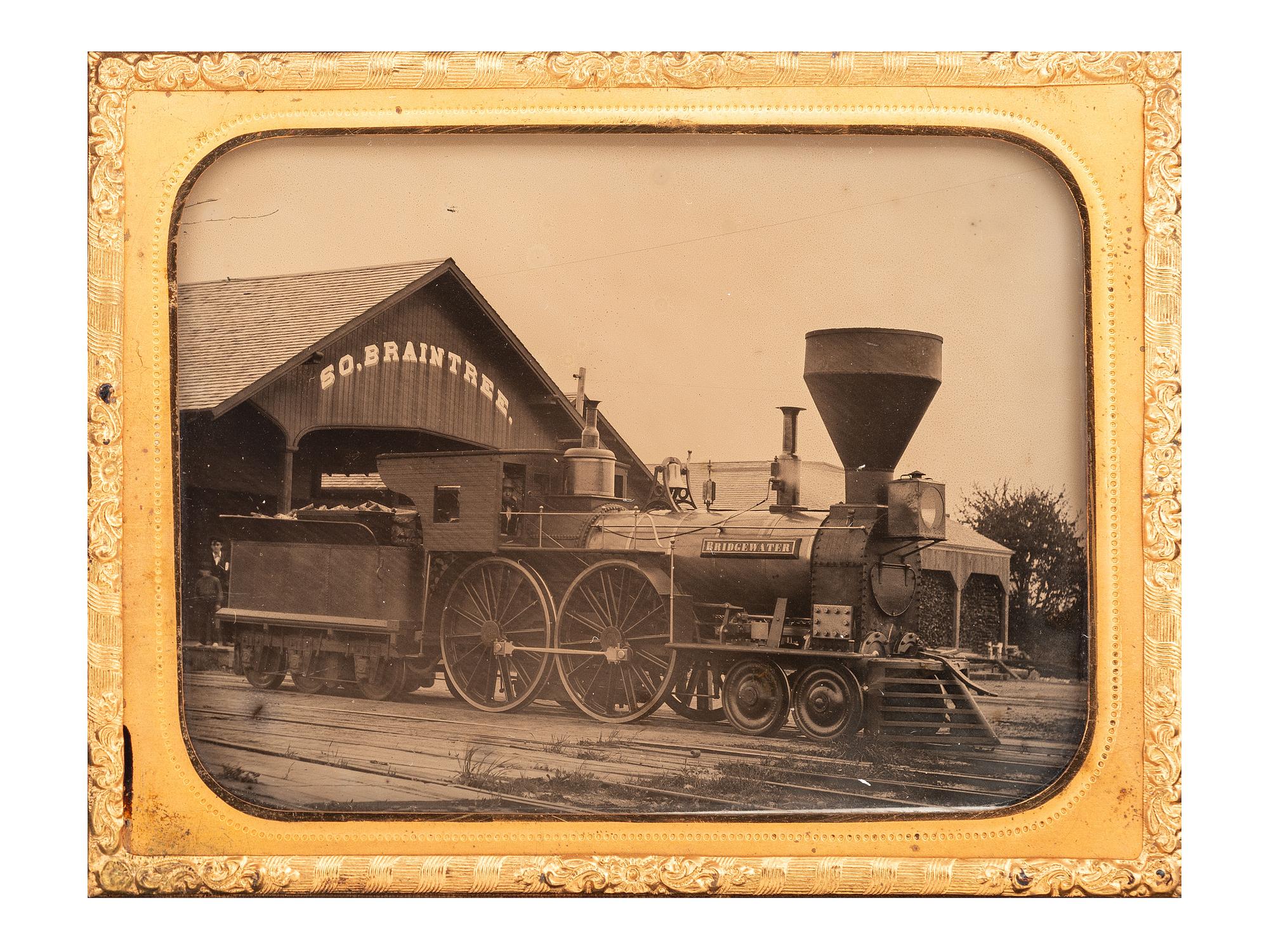 [EARLY PHOTOGRAPHY]. Quarter plate ambrotype of a train engine and tender at the South Braintree, Massachusetts, train station.