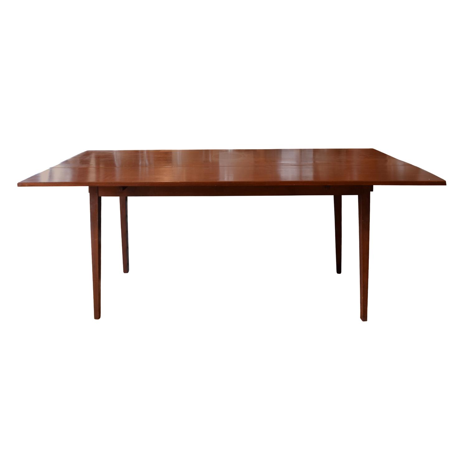 A Mid Century Cherry Drop Leaf Table 71" W x 19.5-39.5" D x 30" H — United States, Mid-20th Century