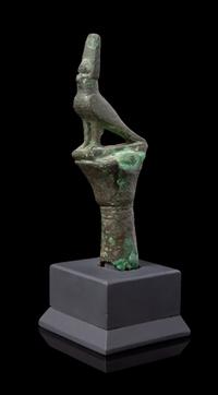 An Egyptian Bronze Horus Finial Height 4 1/4 inches. — LATE PERIOD TO PTOLEMAIC PERIOD, 664-30 B.C.E.