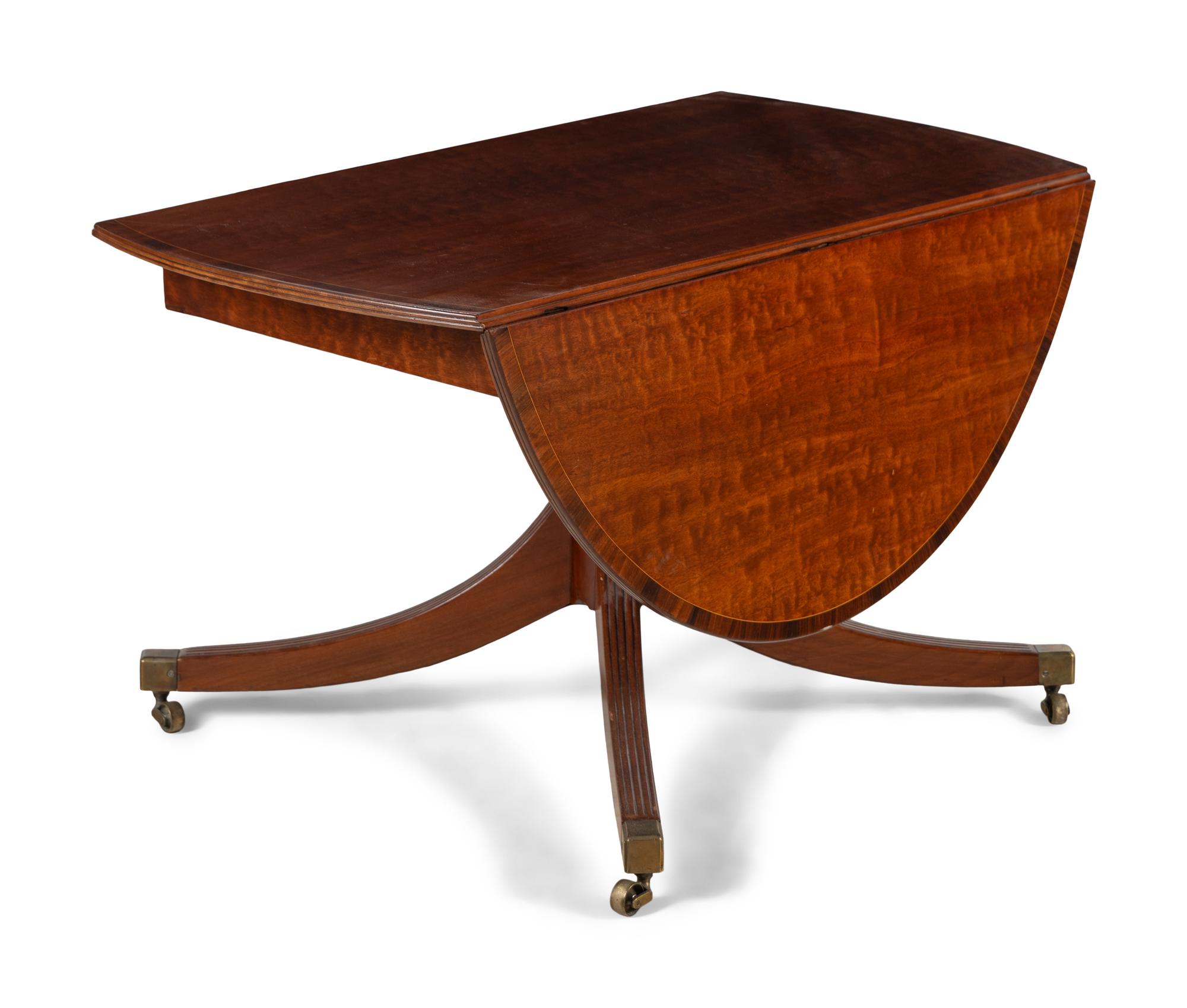 A Regency Inlaid Mahogany Drop Leaf Dining Table