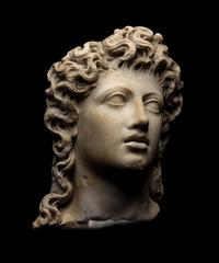 A Roman Marble Head of a Triton