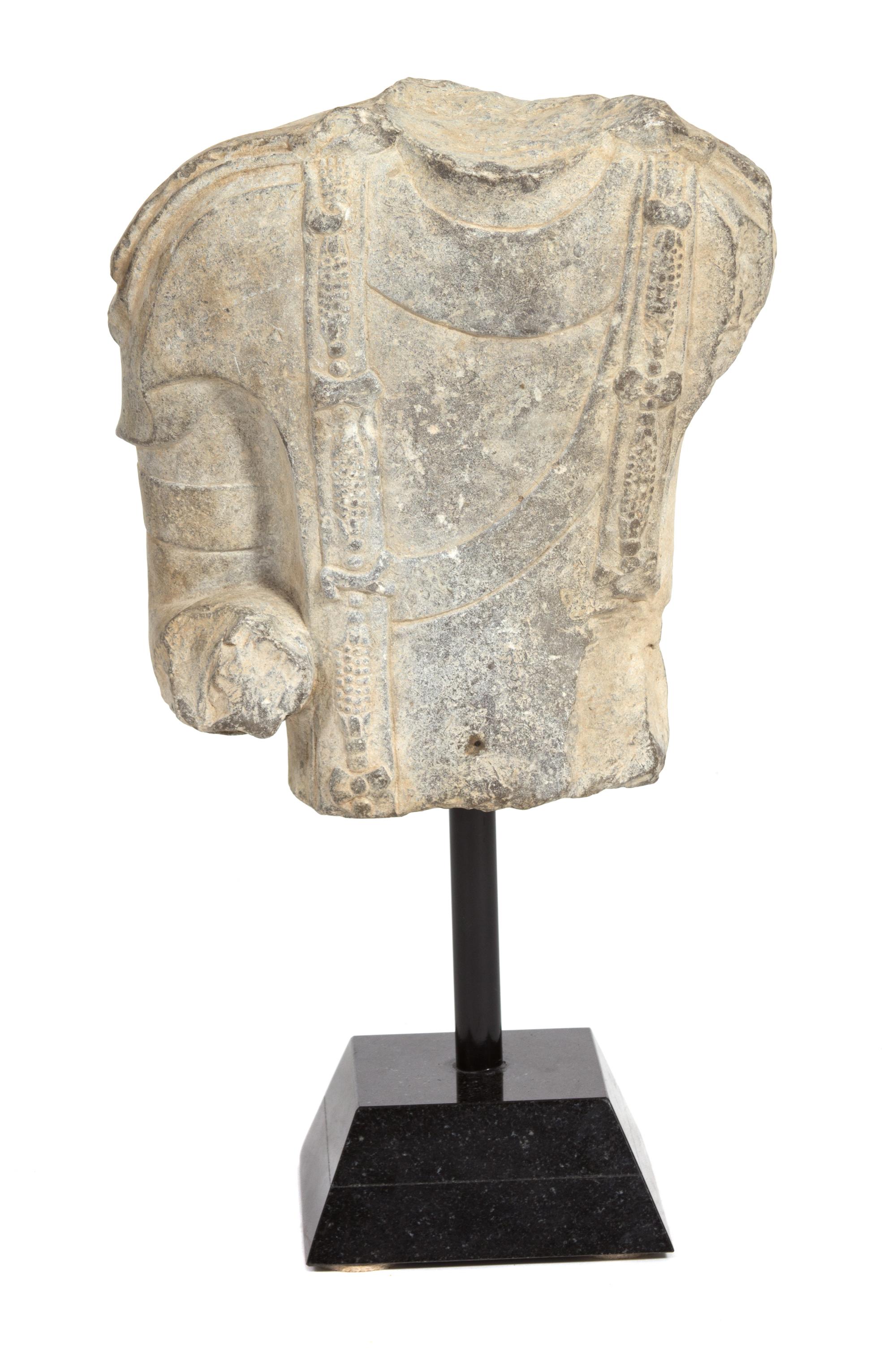 A Chinese Carved Stone Torso Fragment Height of fragment 11 x width 10 inches. — 19TH CENTURY