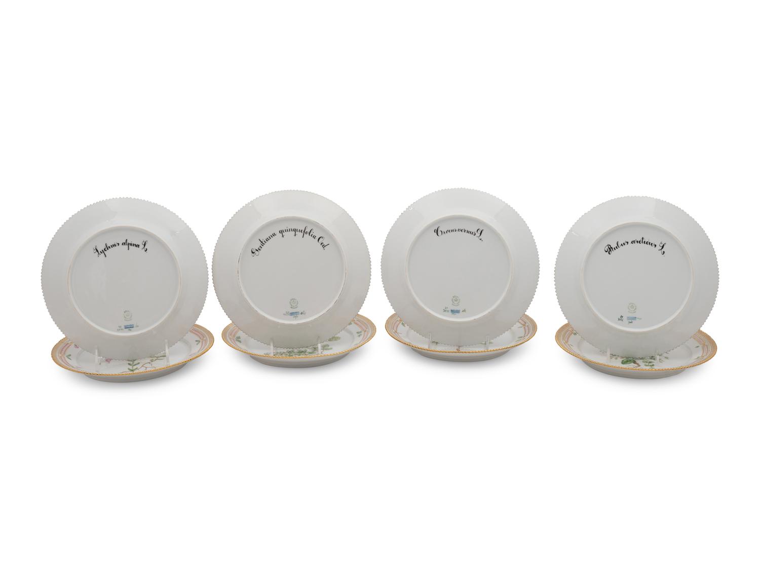 A Set of Eight Royal Copenhagen Flora Danica Porcelain Luncheon Plates