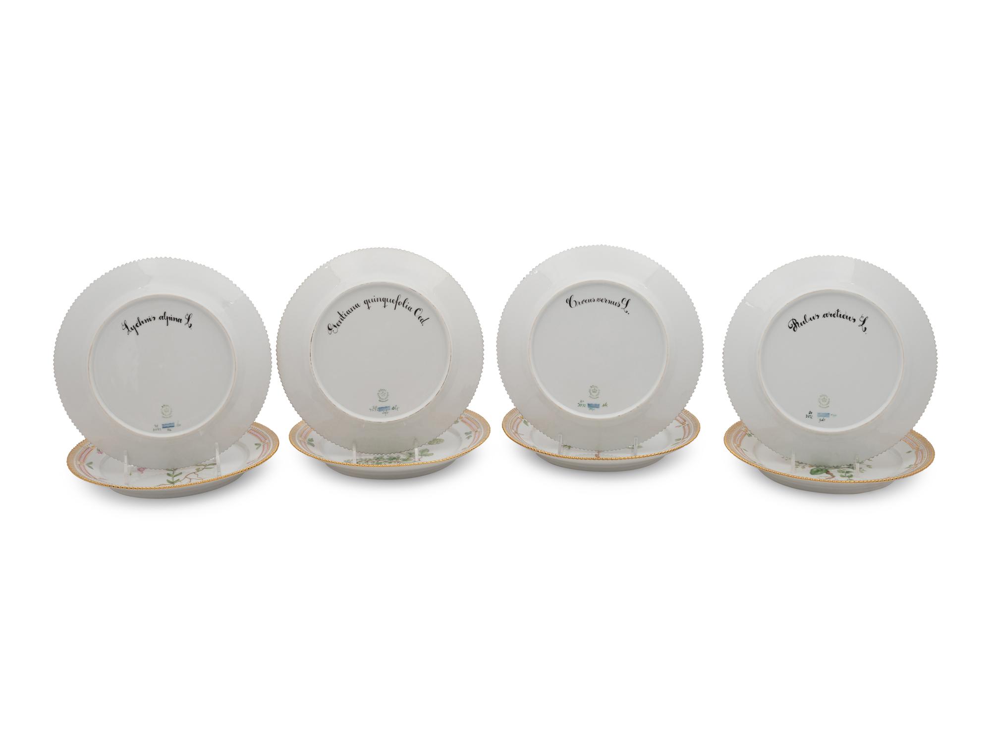 A Set of Eight Royal Copenhagen Flora Danica Porcelain Luncheon Plates