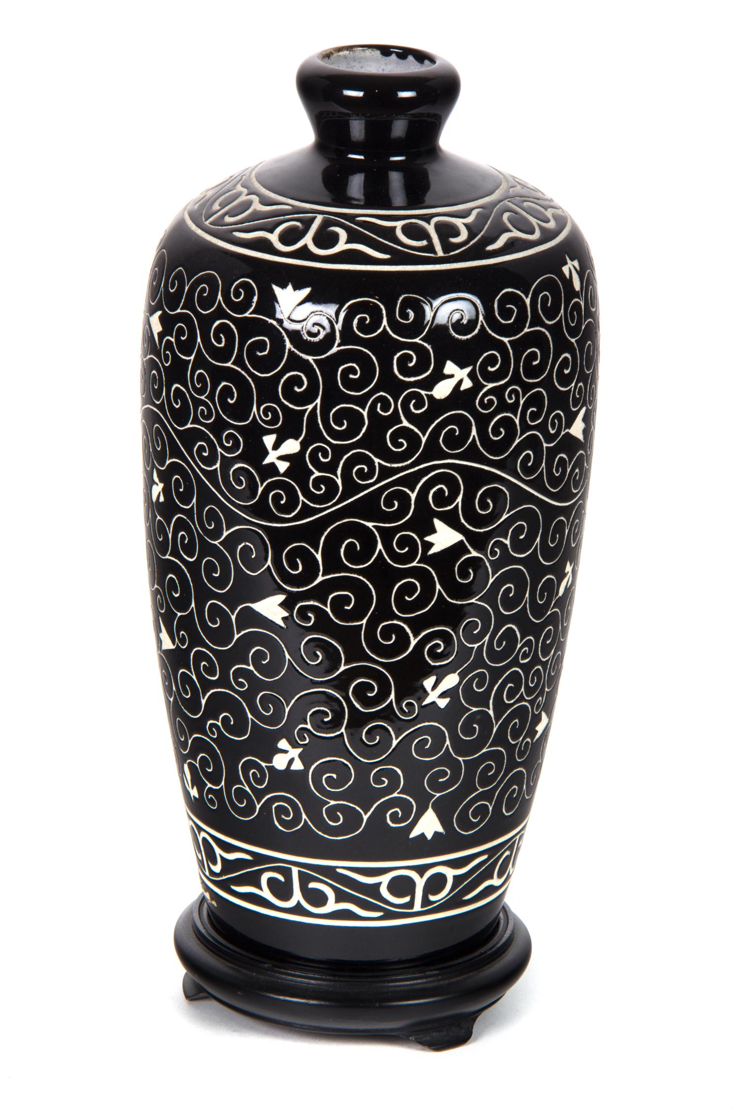 A Black and White Ceramic Vase Height 12 inches. — 20TH CENTURY