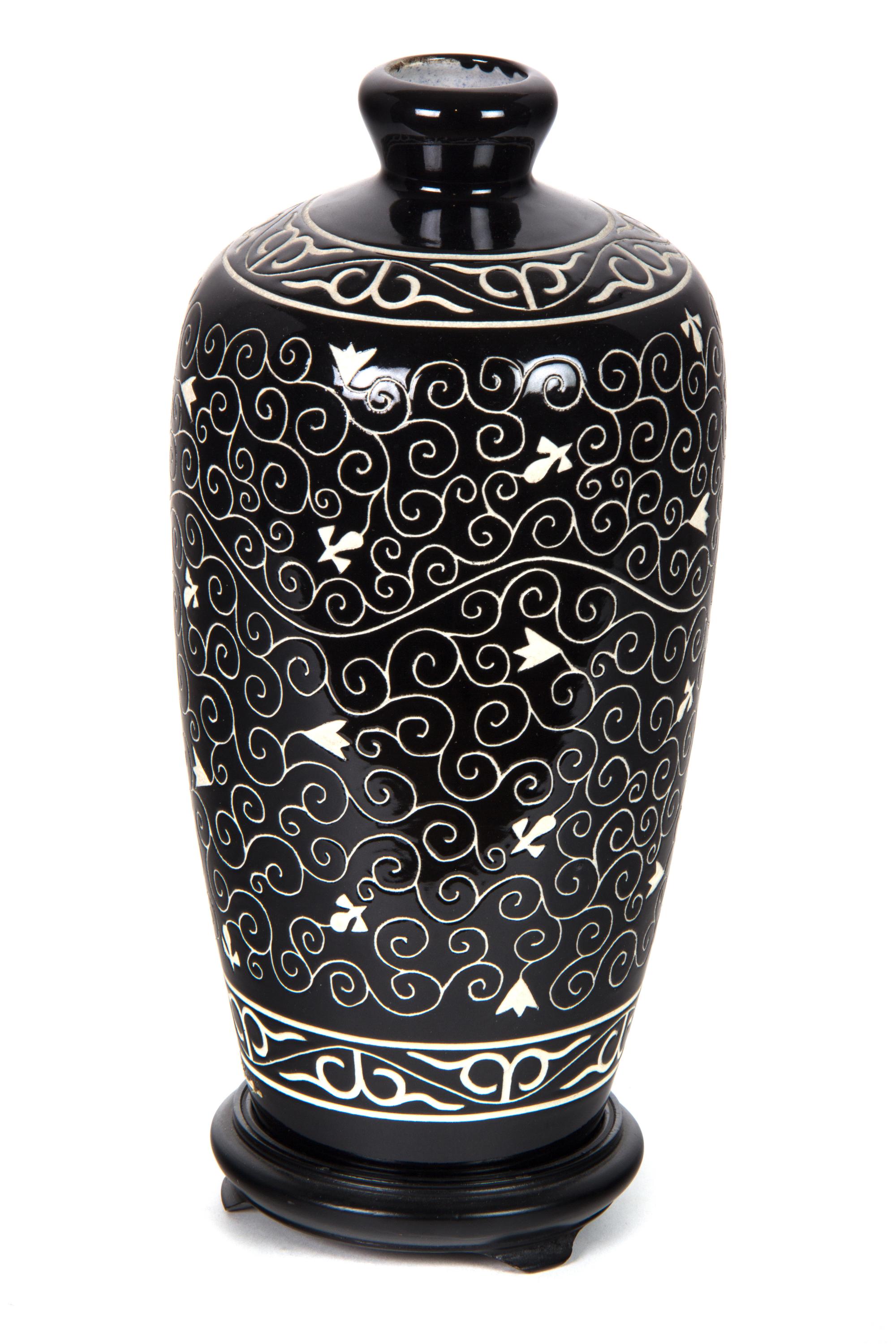 A Black and White Ceramic Vase Height 12 inches. — 20TH CENTURY