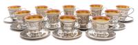 A Set of Twelve American Silver-Lined Porcelain Coffee Cups, Barbour Silver Co., Hartford, CT, each Lenox porcelain bowl with a pink an