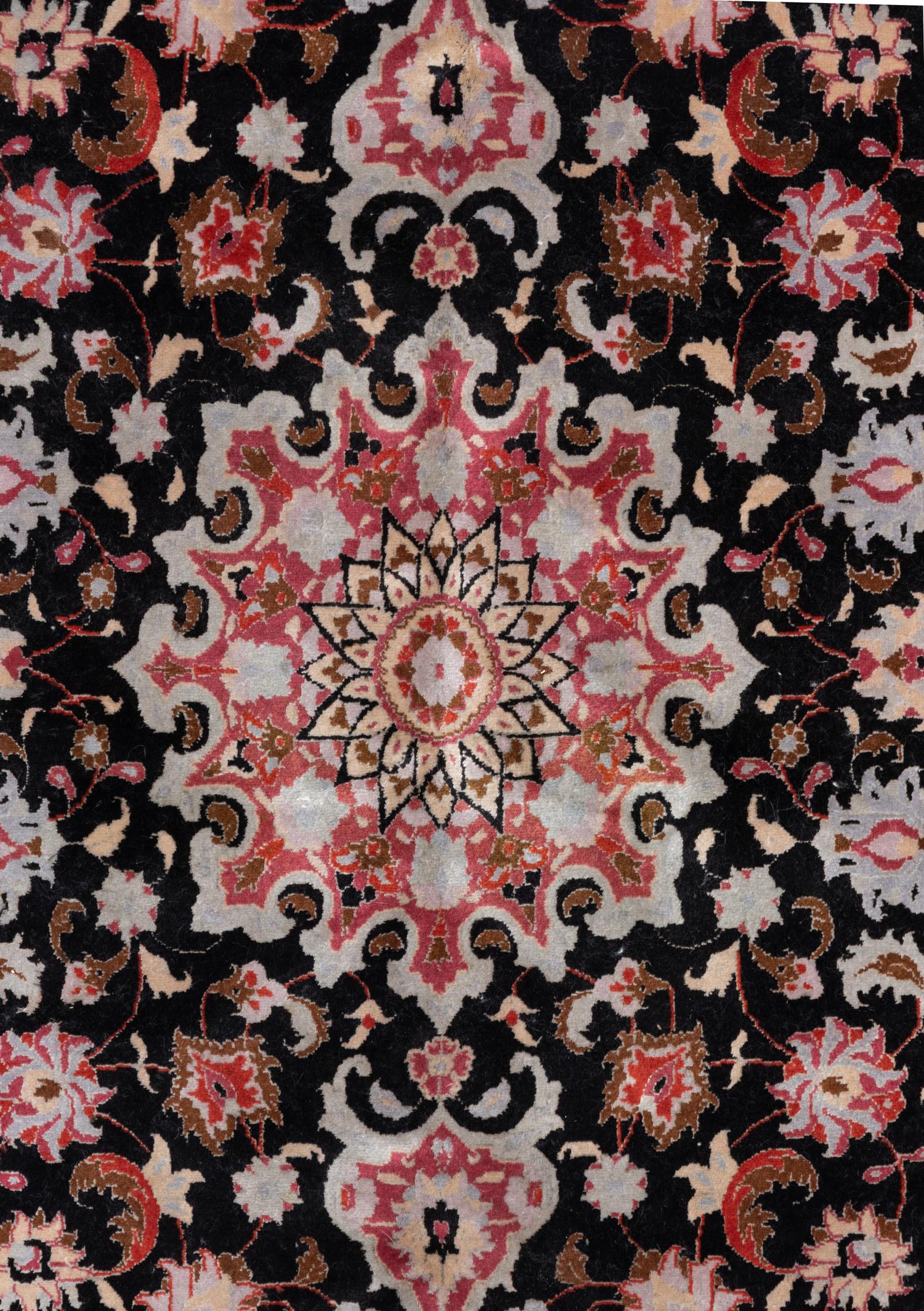 A Tabriz Wool Rug