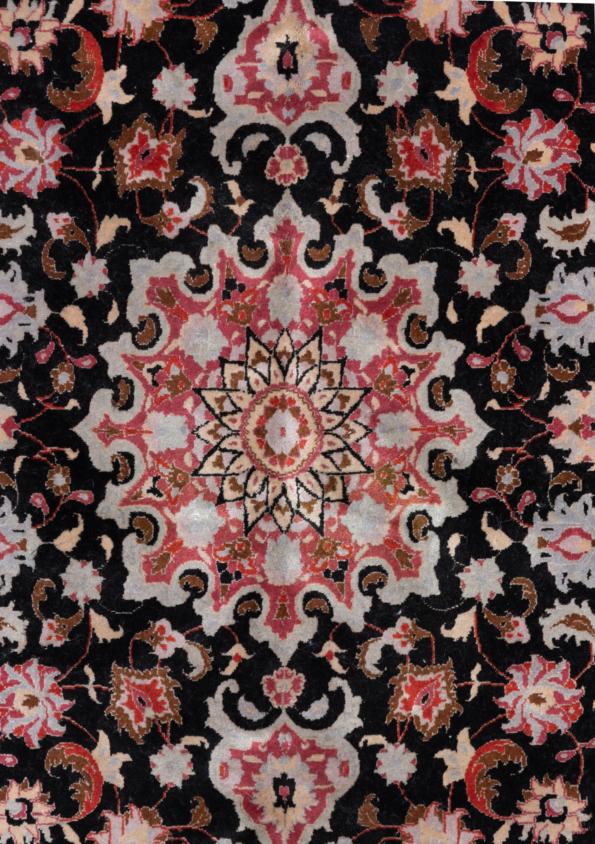 A Tabriz Wool Rug