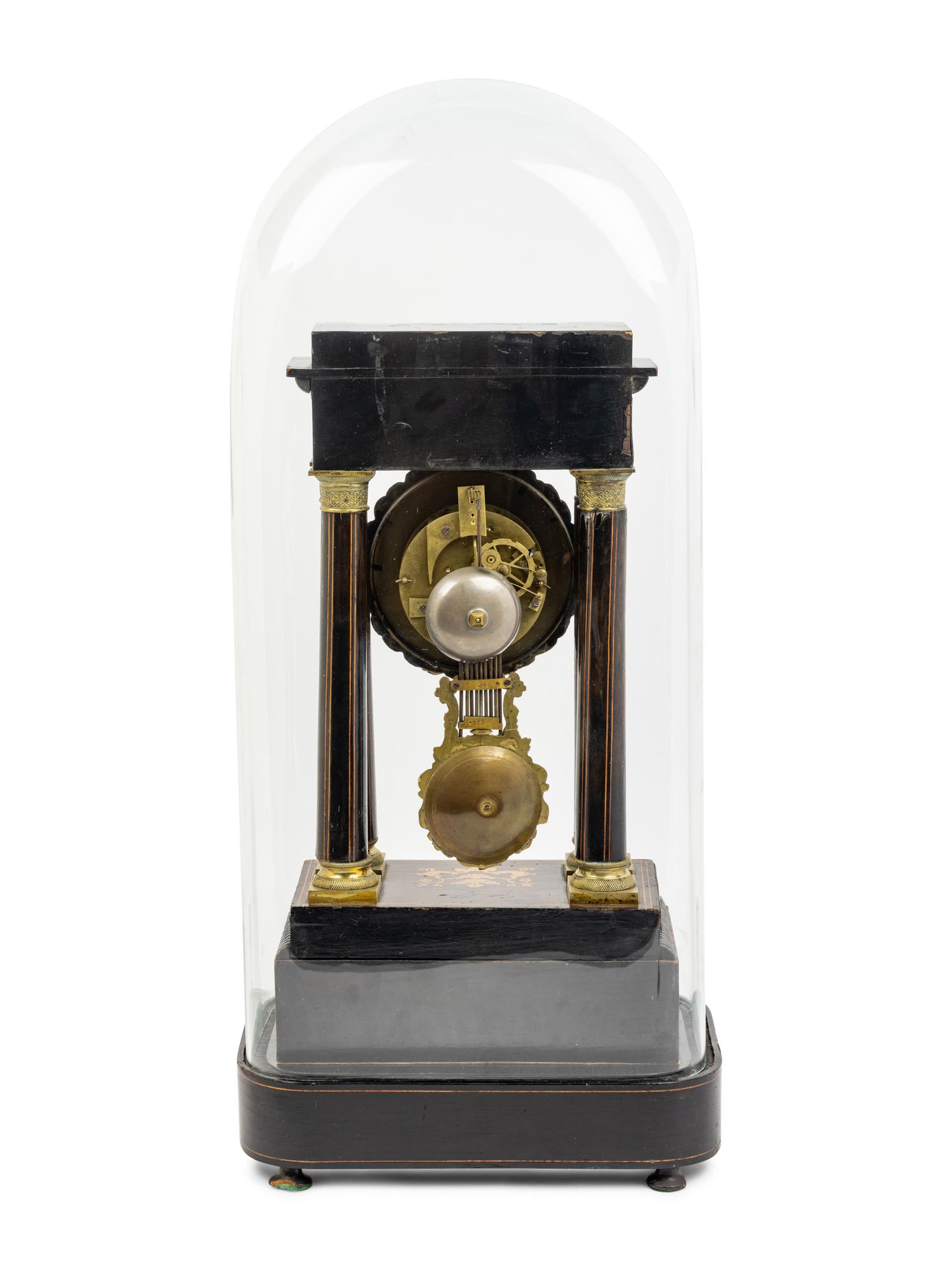 A Charles X Marquetry Mantel Clock