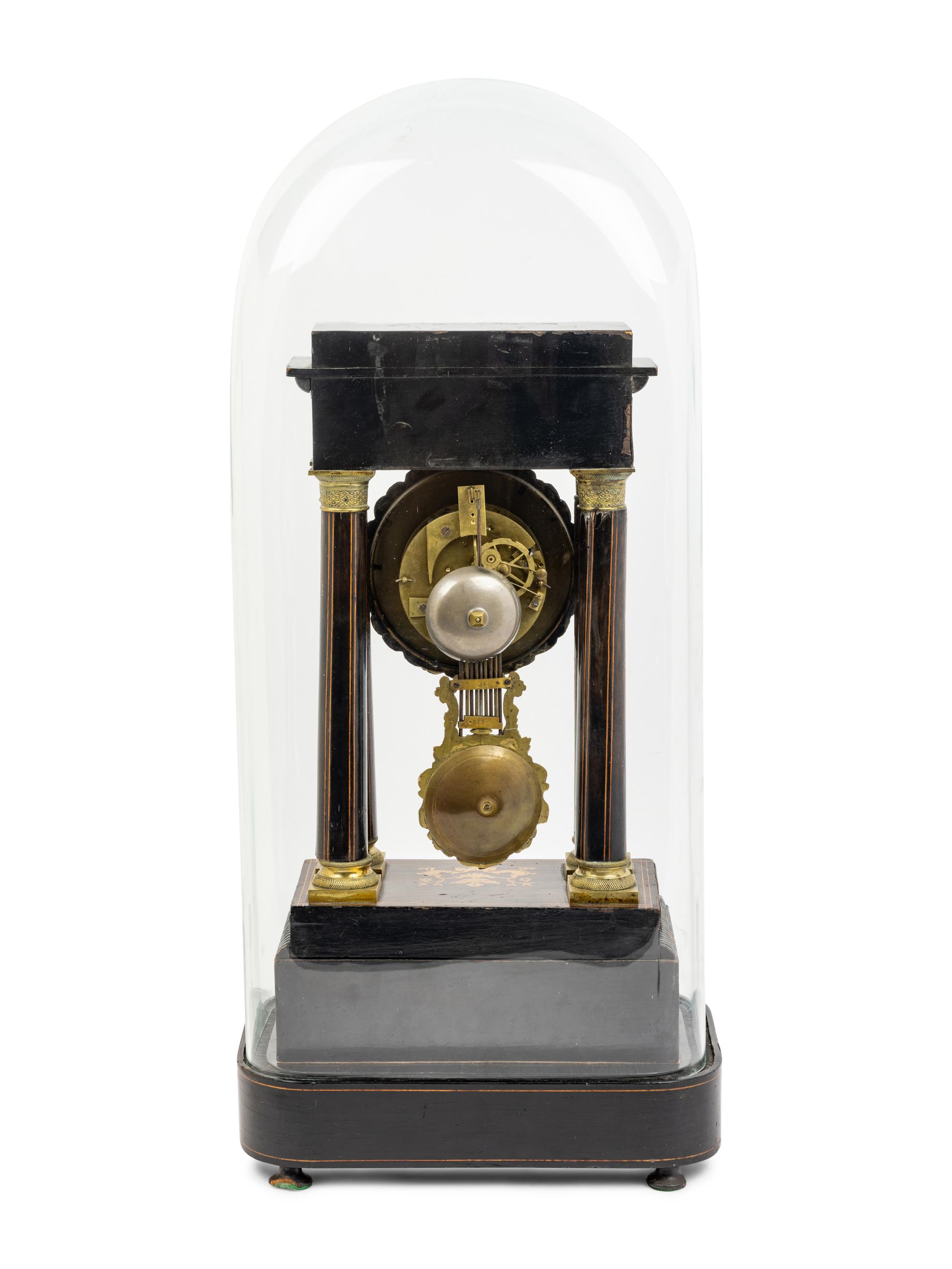 A Charles X Marquetry Mantel Clock
