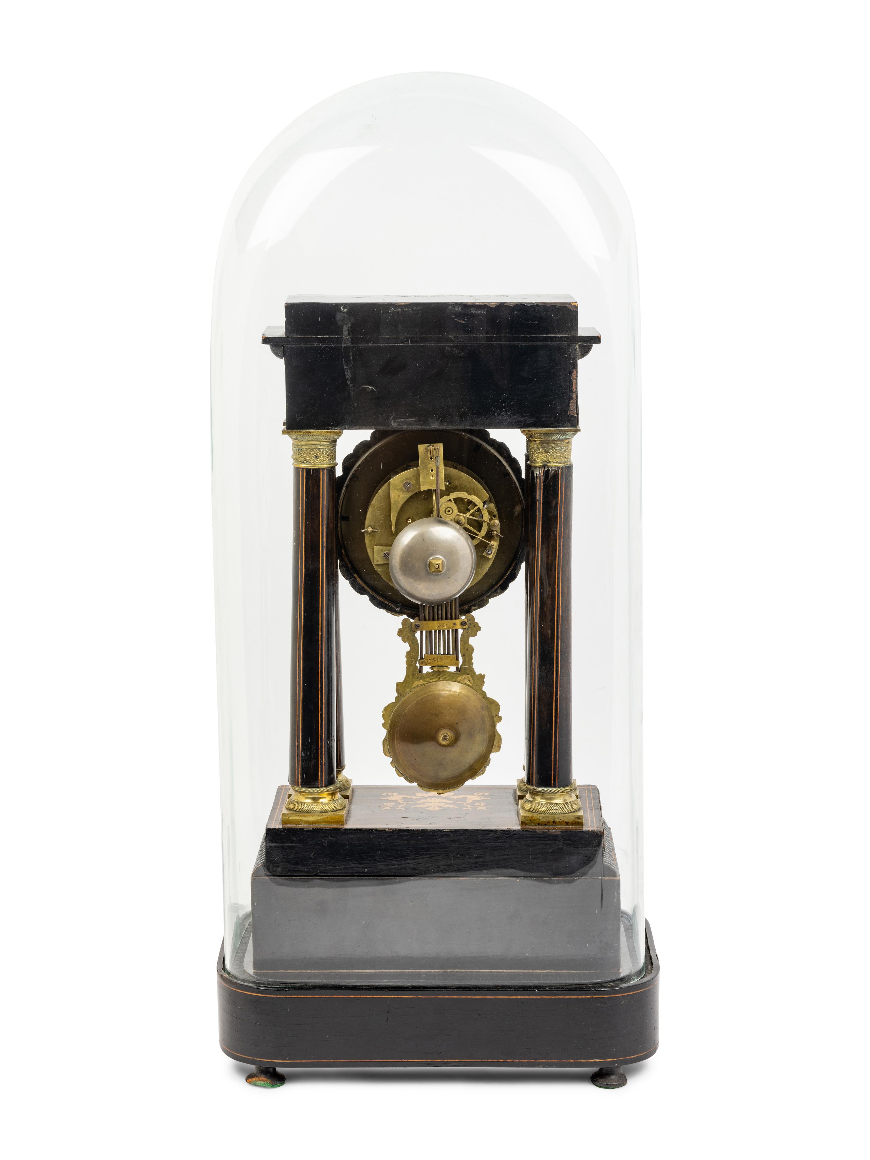 A Charles X Marquetry Mantel Clock