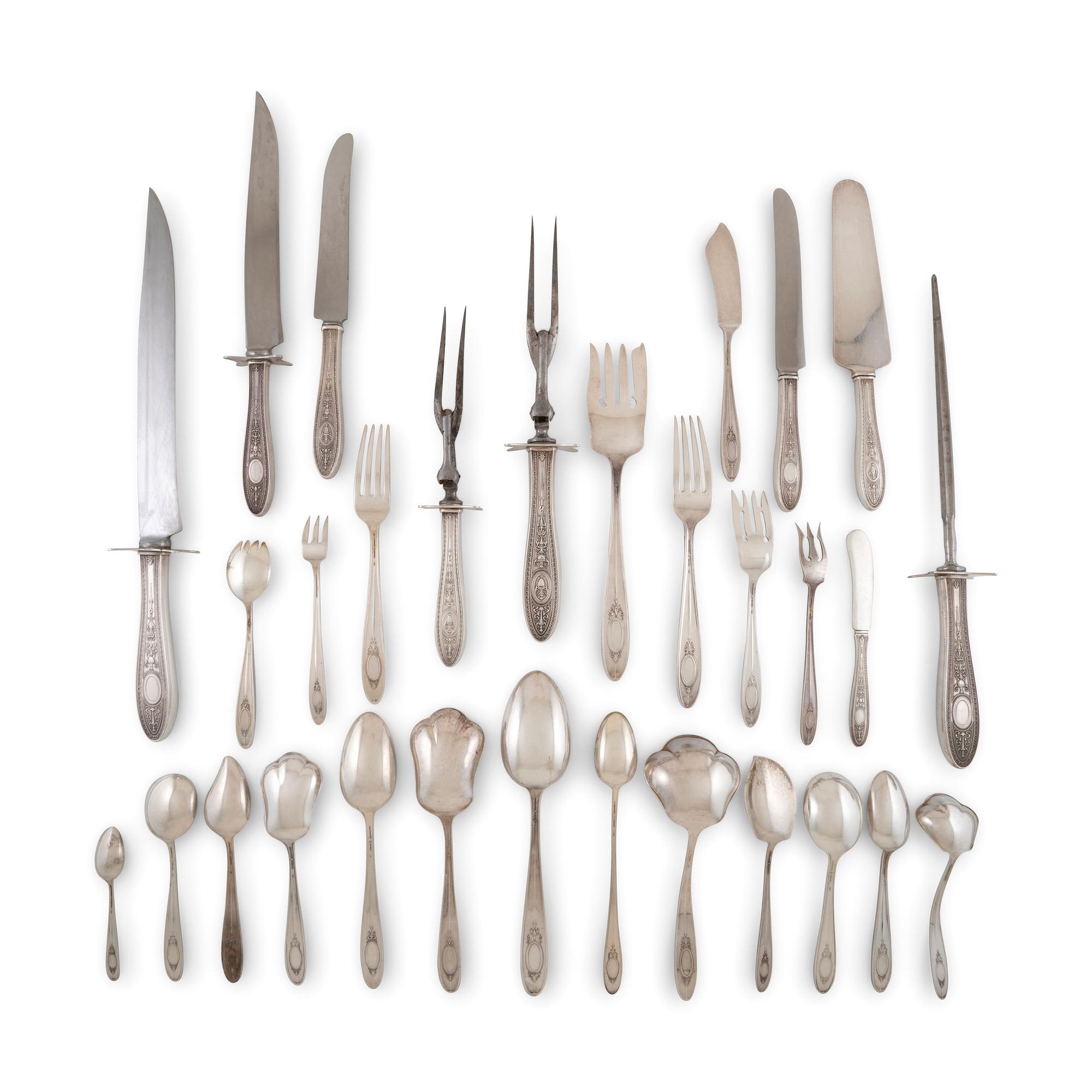 An International Silver Flatware Service in Custom Case