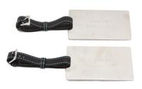 A Pair of Tiffany & Co. Silver Luggage Tags, Strap: 9"; Tag: 4" x 2.5".