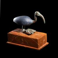 An Egyptian Bronze and Glass Ibis