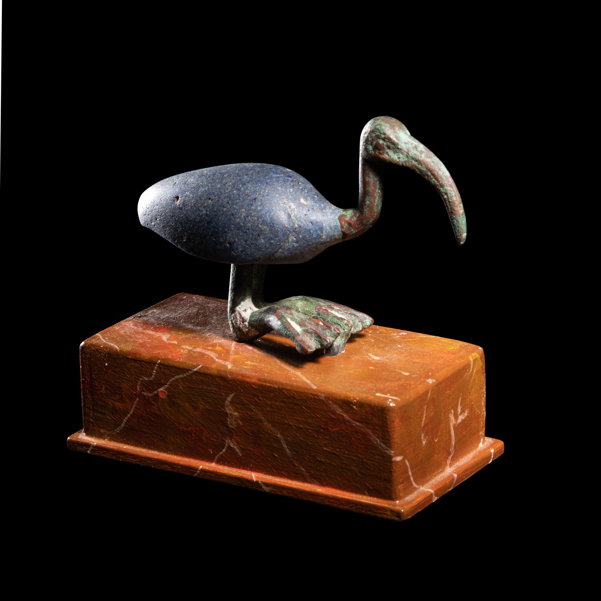 An Egyptian Bronze and Glass Ibis
