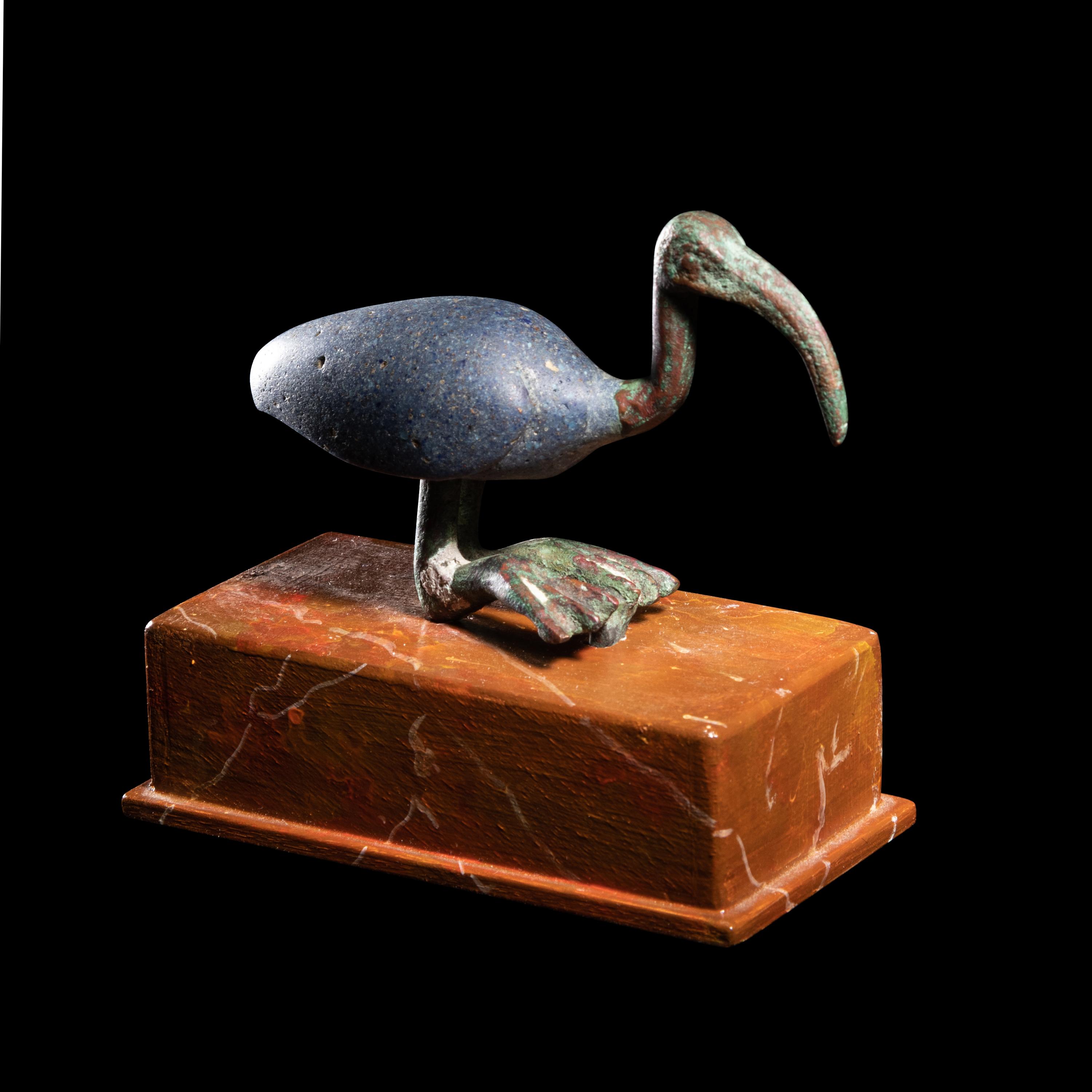 An Egyptian Bronze and Glass Ibis