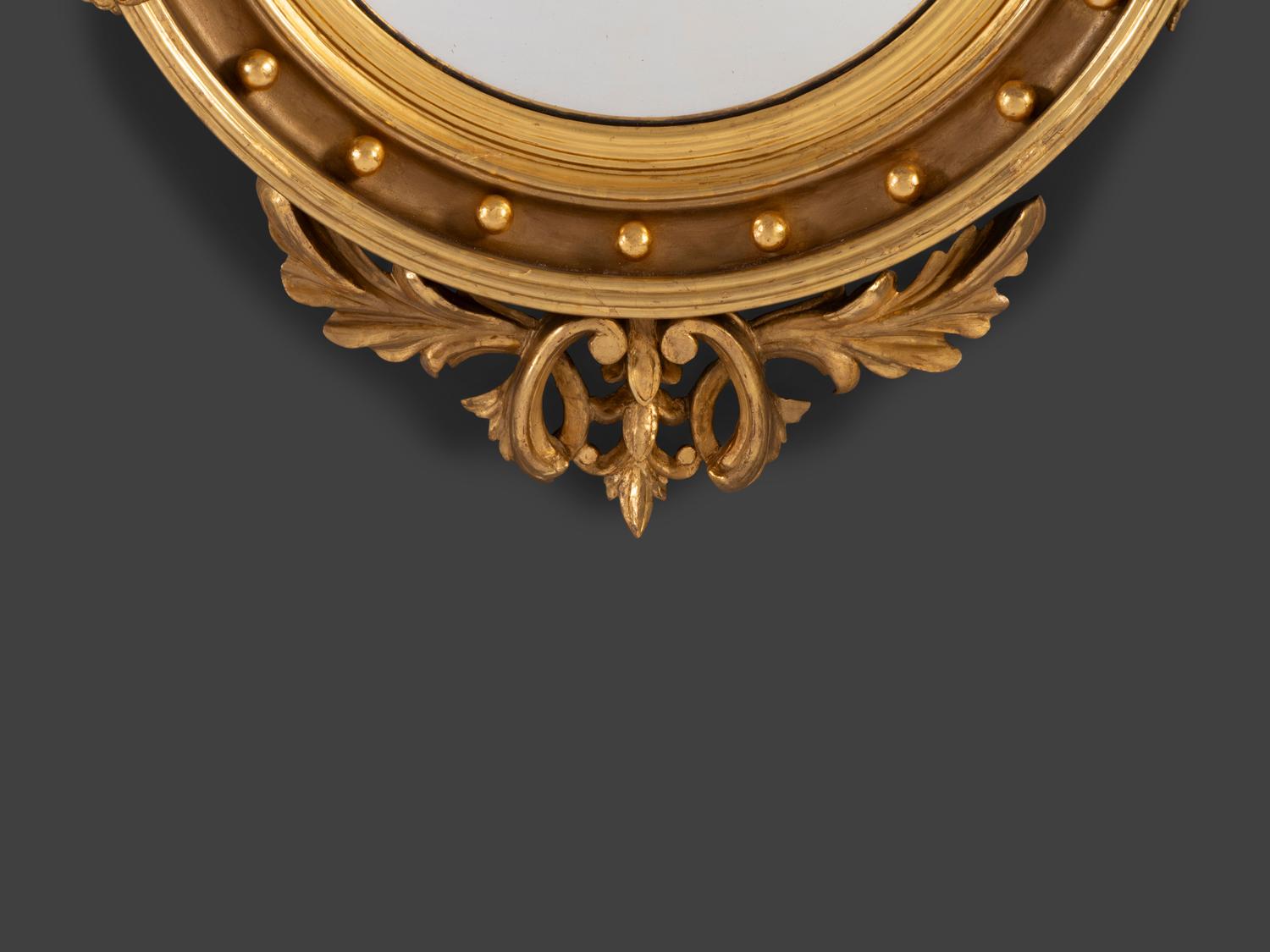 A Federal Giltwood Bull's Eye Six-Light Girandole Looking Glass
