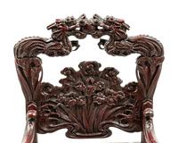 A Chinese Export Carved Hardwood Armchair