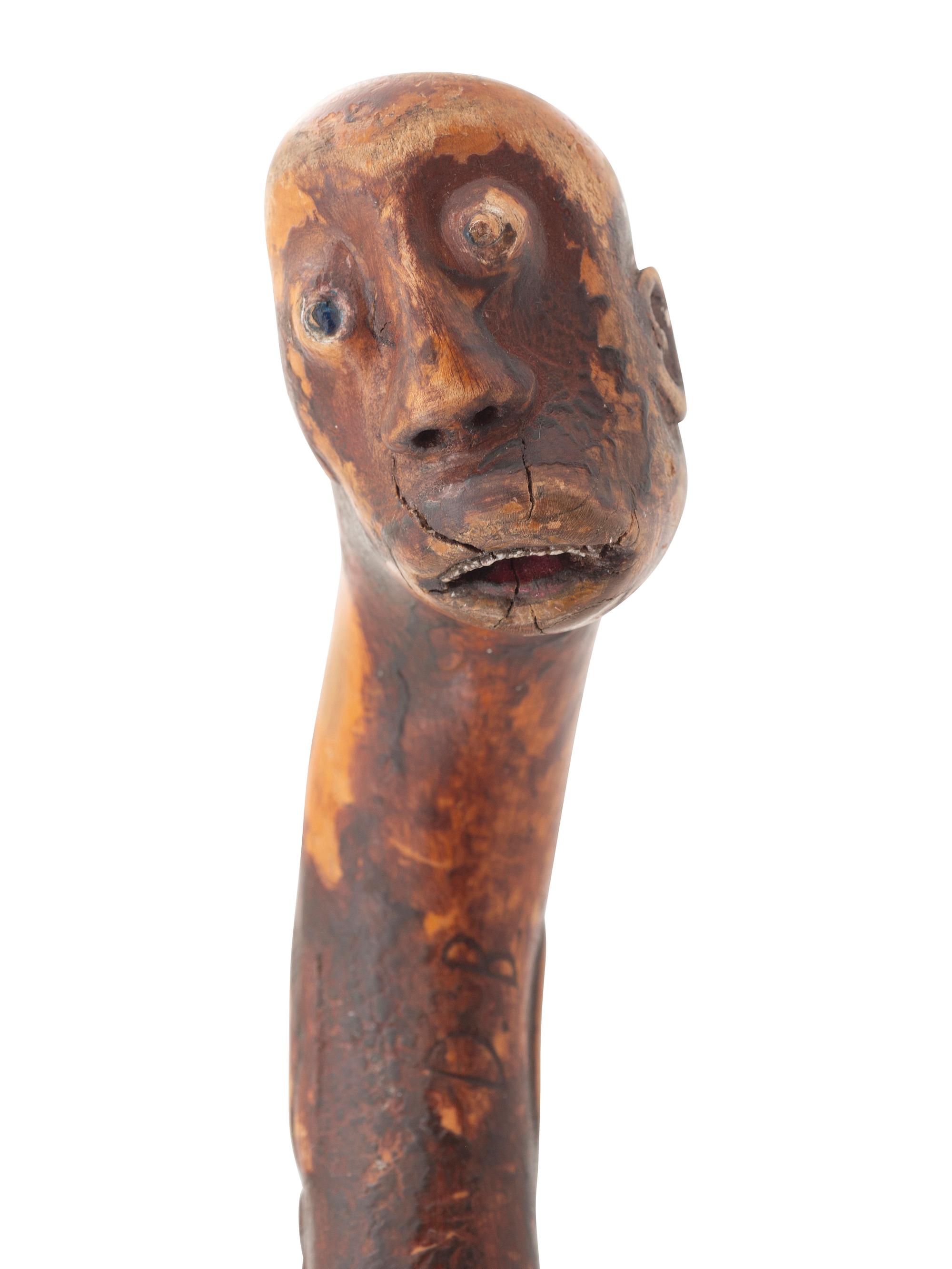 A Folk Art Carved and Painted Wood Jazz Walking Stick