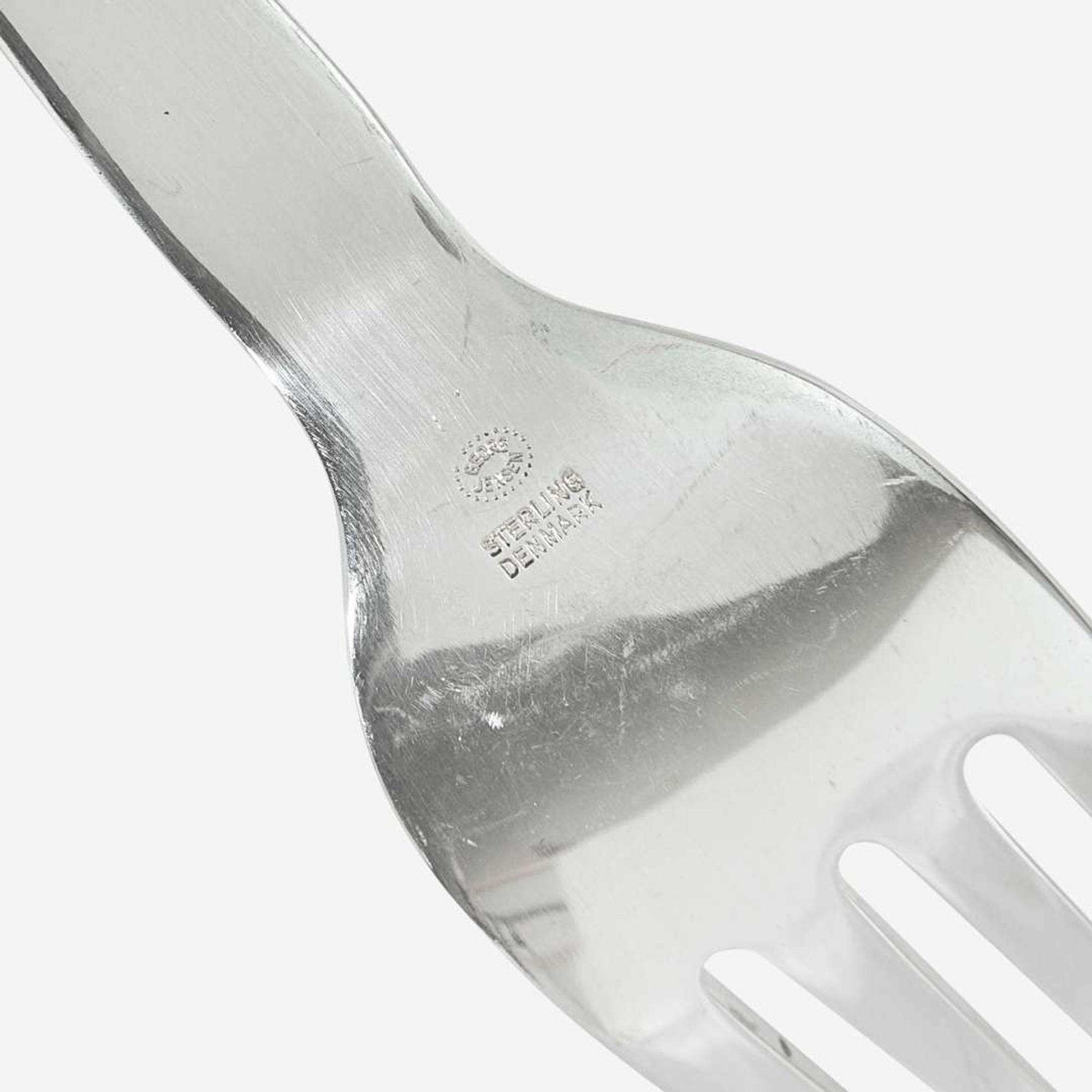 Georg Jensen (Danish, 1866-1935) A Sterling Flatware Service for Twelve in the "Blossom" Pattern, Georg Jensen, Denmark, designed 1919, the present lot late 20th century