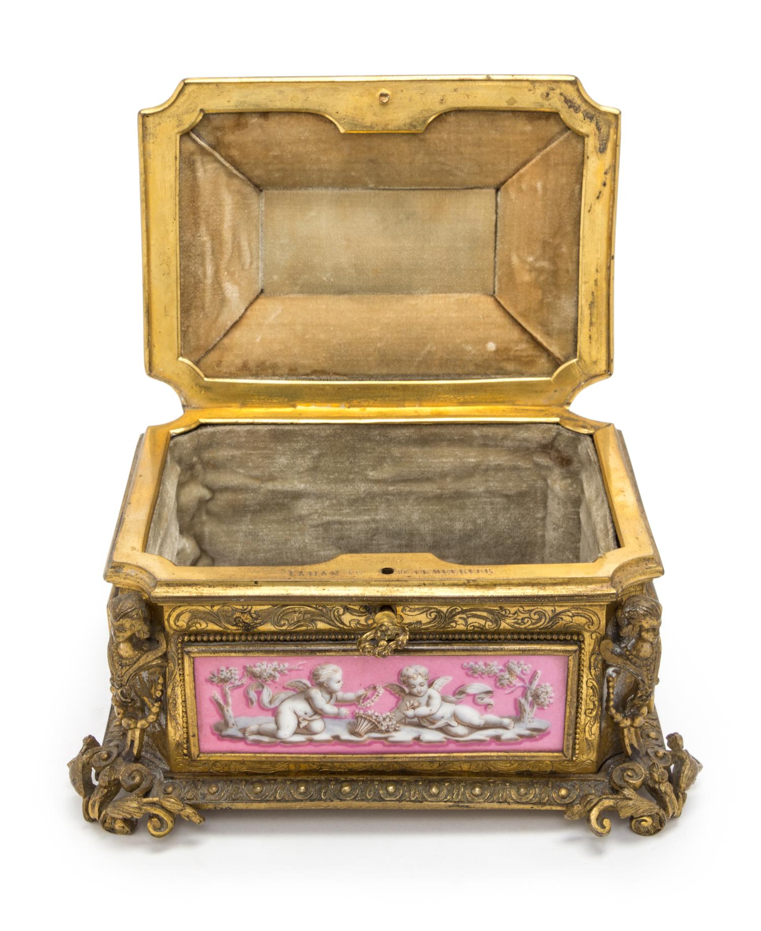 A Napoleon III Sevres Porcelain Mounted Gilt Bronze Table Casket Height 5 x width 7 1/2 x depth 5 1/2 inches. — TAHAN